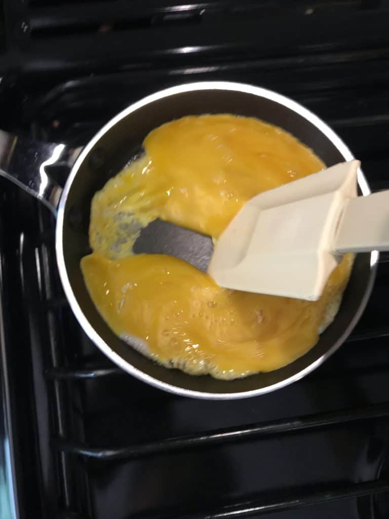 Eggs cooking in pan